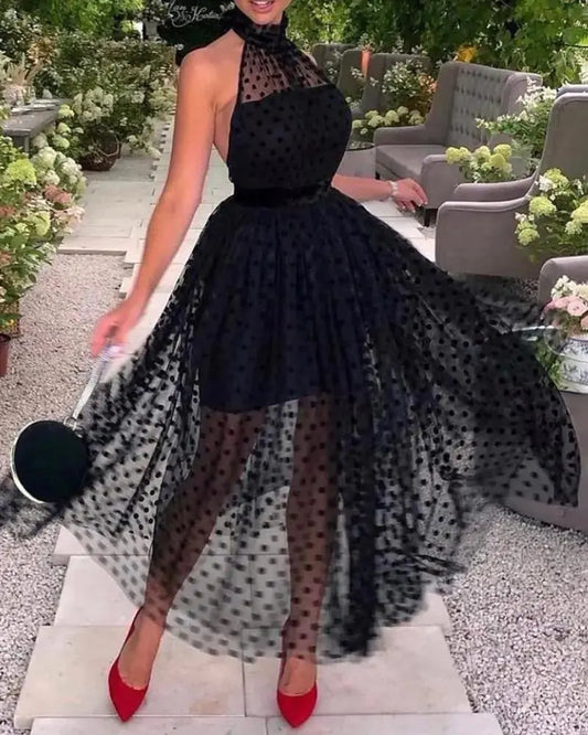 Zwarte Swing Jurk met Polka Dots – Elegant & Tijdloos