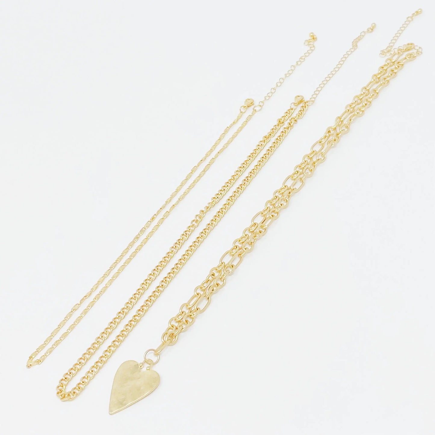 Heart Charm Layered Chain Necklace – Set van 3 Kettingen met Gehamerd Hart