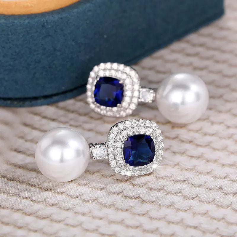 Elegant Pearl Earrings with Blue Zirconia Inlay
