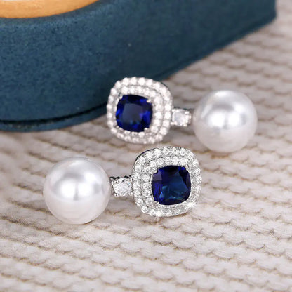 Elegant Pearl Earrings with Blue Zirconia Inlay