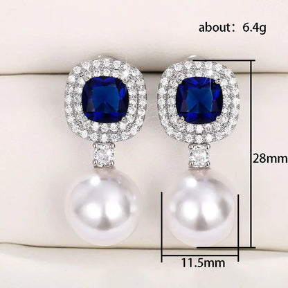 Elegant Pearl Earrings with Blue Zirconia Inlay